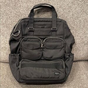 Lug Via 2 Convertible Black Backpack with Durable Fabric and Top Handle